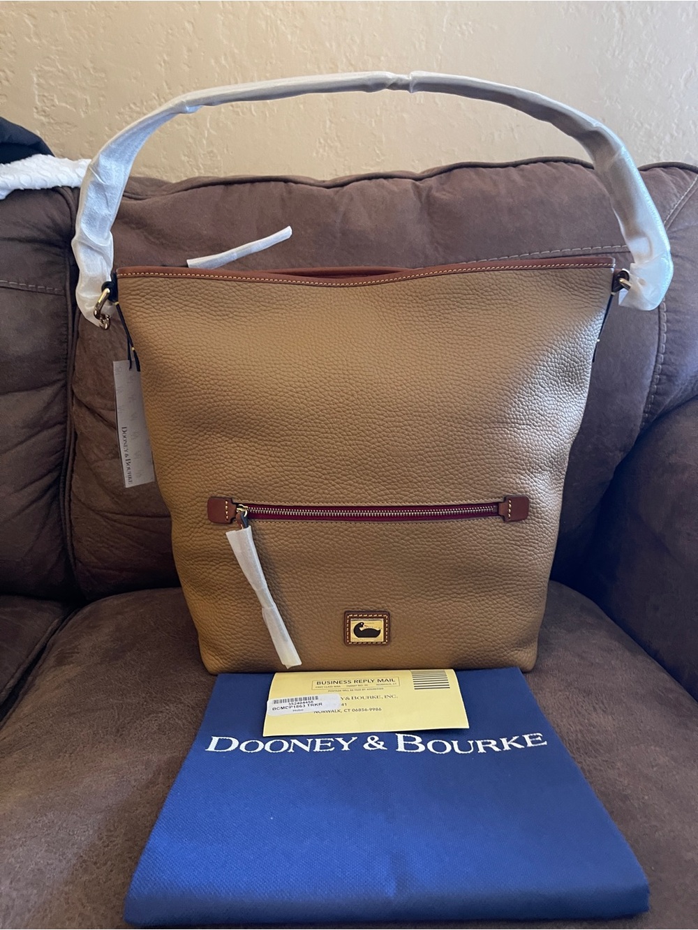 Dooney & Bourke Tan Pebbled Leather Bag with Brown Trim